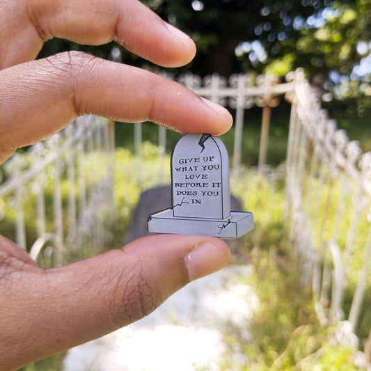 give up what you love enamel pin