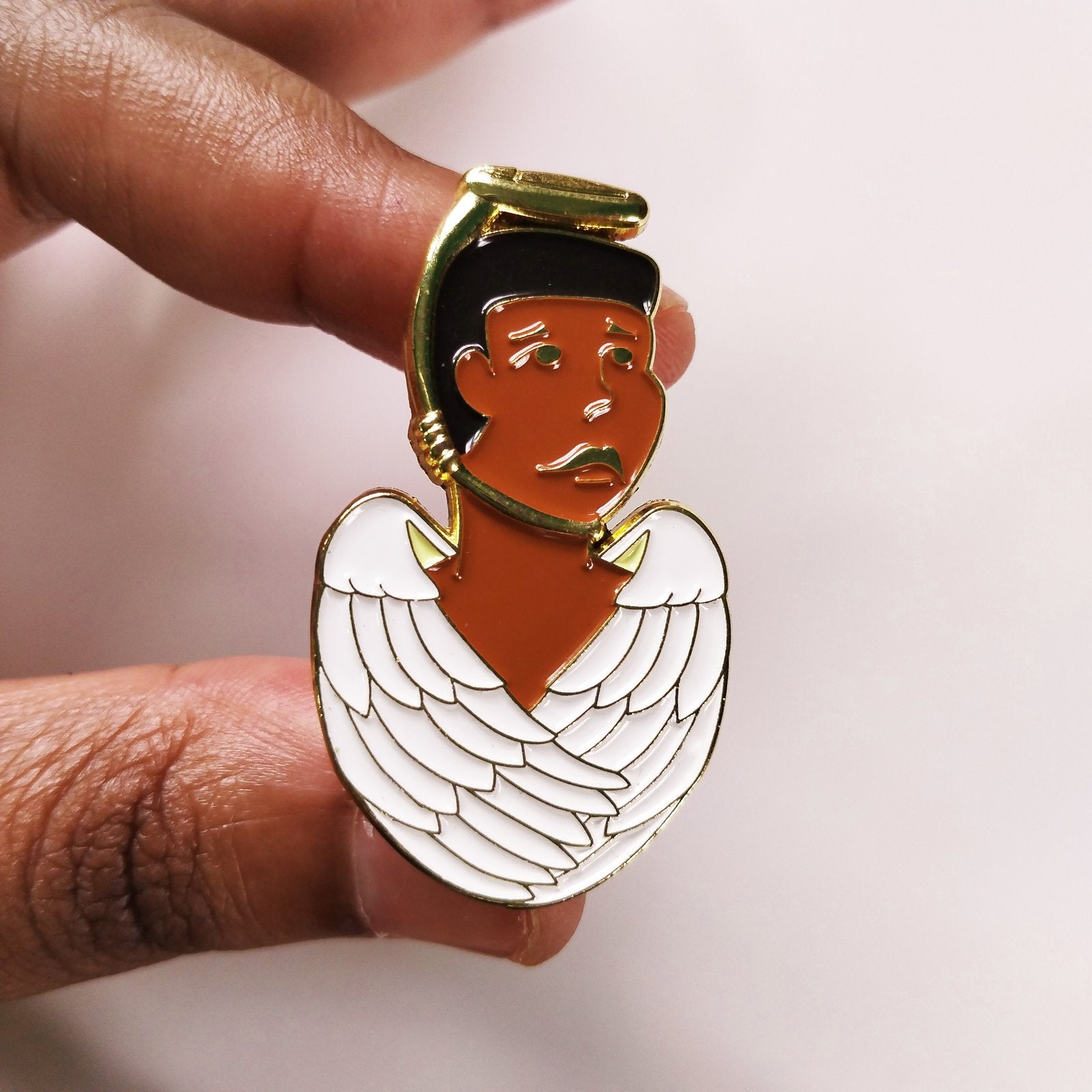 angel choking enamel pin